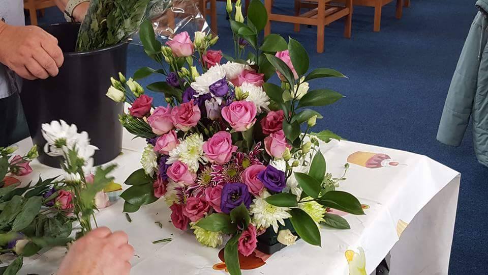 Flower arranging lesson from the lovely Maureen… ShopperAide Ltd
