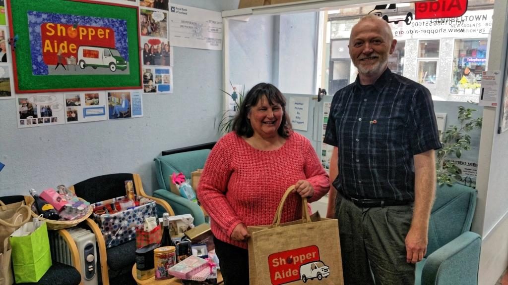 Susan and Charlie draw the raffle winners.